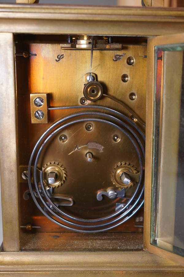 A cased repeating carriage clock, signed Oldfield, Liverpool to the face, striking on a coiled gong, with an engraved dedication to the top dated 11 February 1899. Condition - fair.